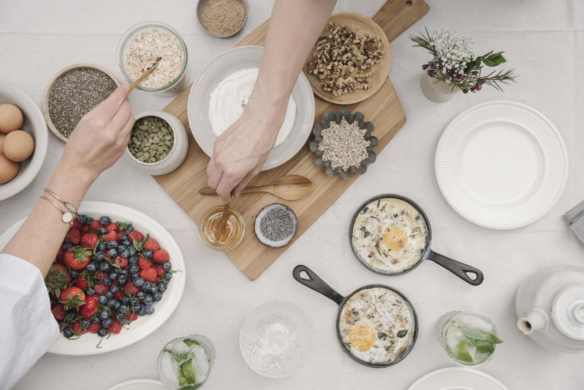 Stacked bowls with grains and herbs